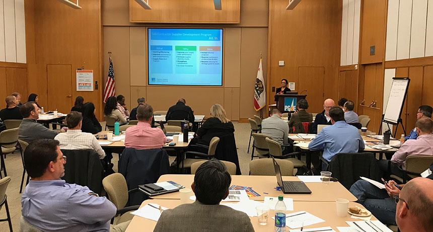 A speaker gives a presentation to PG&E employees at a diversity conference.