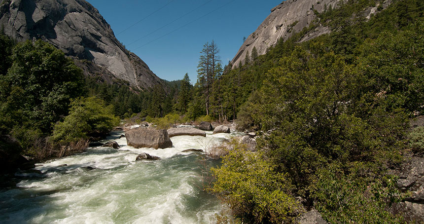 A river flowing between mountain peaks
