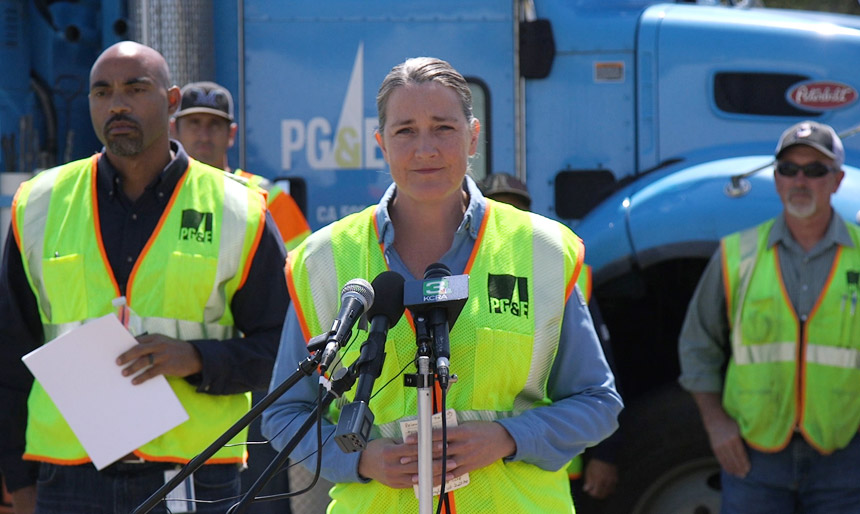 Patti Poppe speaking at a press conference