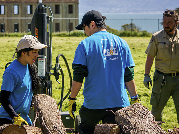 PG&E volunteers cleaning a park